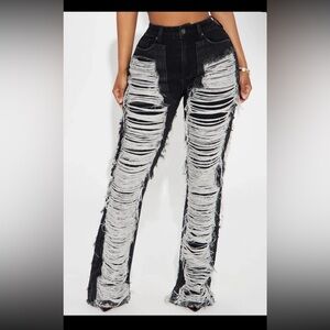 Shredded boot cut jeans